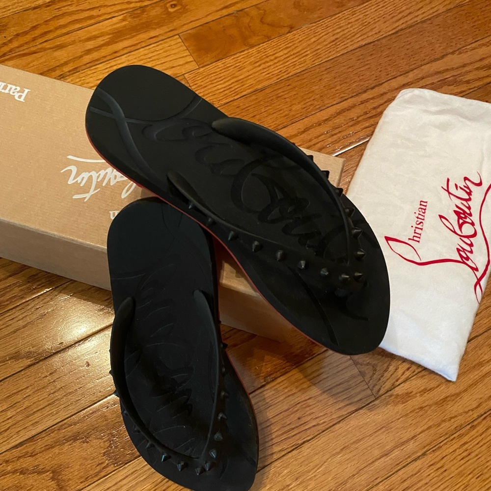 Christian Loubiutin flip flops